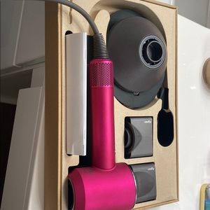 Dyson supersonic hair dryer with accessories